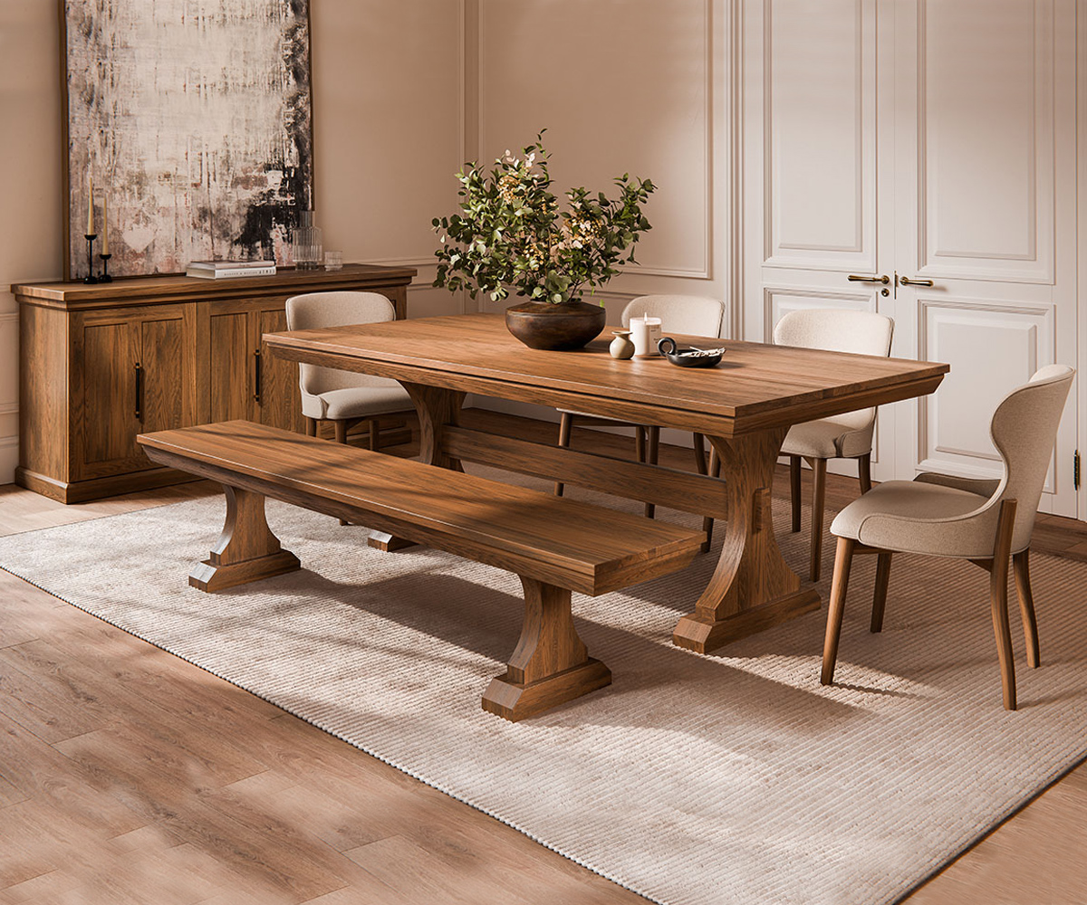 Solid wood dining table and bench in Bend showroom, neutral modern setting